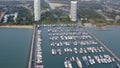 Aerial View by Drone of Yacht Club and Marina. Top view of yacht club. White boats in sea water. Marina dock yachts and Royalty Free Stock Photo