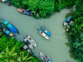 Aerial view from drones of fisherman boats and harbour in the river near the Andaman Sea in southern Thailand. Top view of many Royalty Free Stock Photo