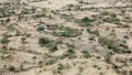 Aerial view of the dry sahel with desert livestock herders in Ethiopia near Somalia