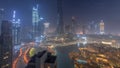 Aerial view of Dubai city early morning during fog night to day timelapse. Royalty Free Stock Photo