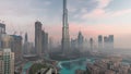 Aerial view of Dubai city early morning during fog night to day timelapse. Royalty Free Stock Photo