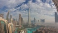 Aerial view of Dubai city early morning during fog night to day timelapse. Royalty Free Stock Photo