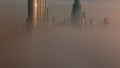 Aerial view of Dubai city early morning during fog timelapse. Royalty Free Stock Photo