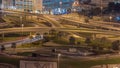 Aerial view on Dubai Marina with big highway intersection night timelapse and skyscrapers around, UAE Royalty Free Stock Photo