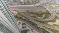 Aerial view on Dubai Marina with big highway intersection timelapse and skyscrapers around, UAE Royalty Free Stock Photo