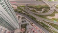 Aerial view on Dubai Marina with big highway intersection timelapse and skyscrapers around, UAE Royalty Free Stock Photo