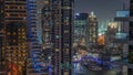 Aerial view on Dubai Marina skyscrapers and the most luxury yacht in harbor night timelapse, Dubai, United Arab Emirates Royalty Free Stock Photo