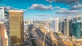 Aerial view of Dubai marina skyscrapers and Jumeirah lakes towers timelapse with traffic on sheikh zayed road. Royalty Free Stock Photo