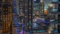 Aerial view on Dubai Marina skyscrapers and the most luxury yacht in harbor night timelapse, Dubai, United Arab Emirates Royalty Free Stock Photo