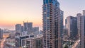 Aerial view of Dubai Marina after sunset from a vantage point day to night timelapse. Royalty Free Stock Photo