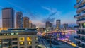 An Aerial view of Dubai Marina Towers in Dubai day to night timelapse Royalty Free Stock Photo