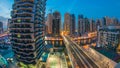 An Aerial view of Dubai Marina Towers in Dubai day to night timelapse Royalty Free Stock Photo