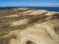 Aerial view with dunes, forest and sea in Curonian spit on a sunny day photographed with a drone. Royalty Free Stock Photo