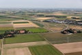 Aerial view Dutch agricultural landscape with farmhouses and highway Royalty Free Stock Photo