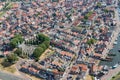 Aerial view Dutch fishing village with harbor and residential area Royalty Free Stock Photo