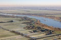 Aerial view Dutch river Lek with view at village Schoonhoven