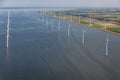 Aerial view Dutch sea with offshore wind turbines along coast Royalty Free Stock Photo
