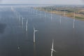 Aerial view Dutch sea with offshore wind turbines along coast Royalty Free Stock Photo