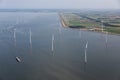 Aerial view Dutch sea with offshore wind turbines along coast Royalty Free Stock Photo