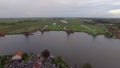 Aerial view of Dutch village with windmills