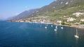 Aerial view from east coast of lake Garda between Brenzone sul Garda and Assenza, with a panning shot from coastline