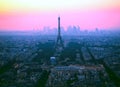 Aerial view of Eiffel tower, La Defense and the rooftops of Paris during a gorgeous sunset, France