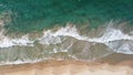 Aerial view of an emerald green sea and big foaming waves. Indian Ocean. Dikwella beach. Sri Lanka