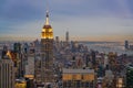 Aerial view of Empire State Building from Rockefeller Center in the evening Royalty Free Stock Photo