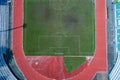 Aerial view of empty green football field with running track Empty stadium view from top Royalty Free Stock Photo