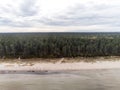 Aerial view on empty Jurmala beach, Cloudy sky, Green forest, nobody. Latvia