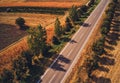 Aerial view of empty road through rural countryside landscape in summer Royalty Free Stock Photo