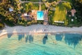 Aerial view of empty sandy beach, sea with azure water and waves Royalty Free Stock Photo