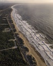 Aerial view of the endless coastline at sunset facing the Atlantic Ocean in Setubal near Lisbon, Portugal