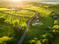 Aerial view of endless lush pastures and farmlands of Ireland. Beautiful Irish countryside with green fields and meadows. Rural Royalty Free Stock Photo