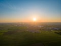 Aerial view of Energy from wind turbines at sunset in the field. wind mills farm. sunset in the countryside, sustainable