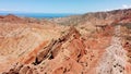 Aerial view of the eroded red rocks of Skazka, or Fairy Tale Canyon, in Kyrgyzstan