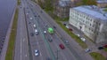 Aerial view of a European city, traffic, river and promenade.