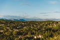 aerial view of european town in mountains on sunset,