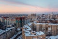 Aerial view of evening Voronezh downtown. Voronezh cityscape at twilight. Modern houses, television broadcast tower