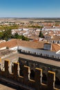 Aerial view of Evora, Portugal from roof of cathedral with terra cotta roof tops and blue sky Royalty Free Stock Photo