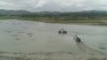 Cleaning and deepening by a dredger on the river. Philippines, Luzon