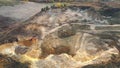 Aerial view of excavator loader inside of sand career.