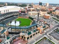 Aerial view of An expansive lush green stadium on a sunny day in the USA