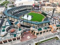 Aerial view of An expansive lush green stadium on a sunny day in the USA