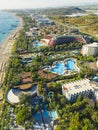 Aerial view of expensive colorful resort area by the beach in Ocurcalar, Turkey. Bright summer sunlight. Tourist