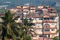 Aerial view of the exterior facade of an old weathered building in the city of Panaji