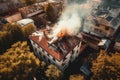 Aerial view of extinguish burning house roof, emergency Royalty Free Stock Photo