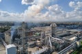 Aerial view of factory with high plant manufacture structure. Global production and manufacturing concept