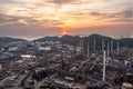 Aerial view of Oil and gas industry - refinery, and Petrochemical plant on island at evening sunset background Royalty Free Stock Photo