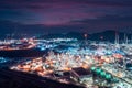 Aerial view of factory zone Oil and gas industry - refinery stores tank and Petrochemical plant on island at twilight over Royalty Free Stock Photo